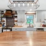 Elegant modern kitchen with custom cabinets and premium wood finishes.