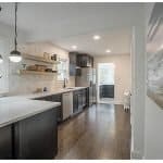 Sleek modern kitchen cabinets with stylish countertops and open shelving for contemporary home design.