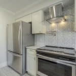 High-quality kitchen cabinets and stainless steel appliances for modern kitchen design.