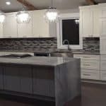 Premium kitchen cabinets with modern design and stylish backsplash from Overland Park Cabinet Studio.